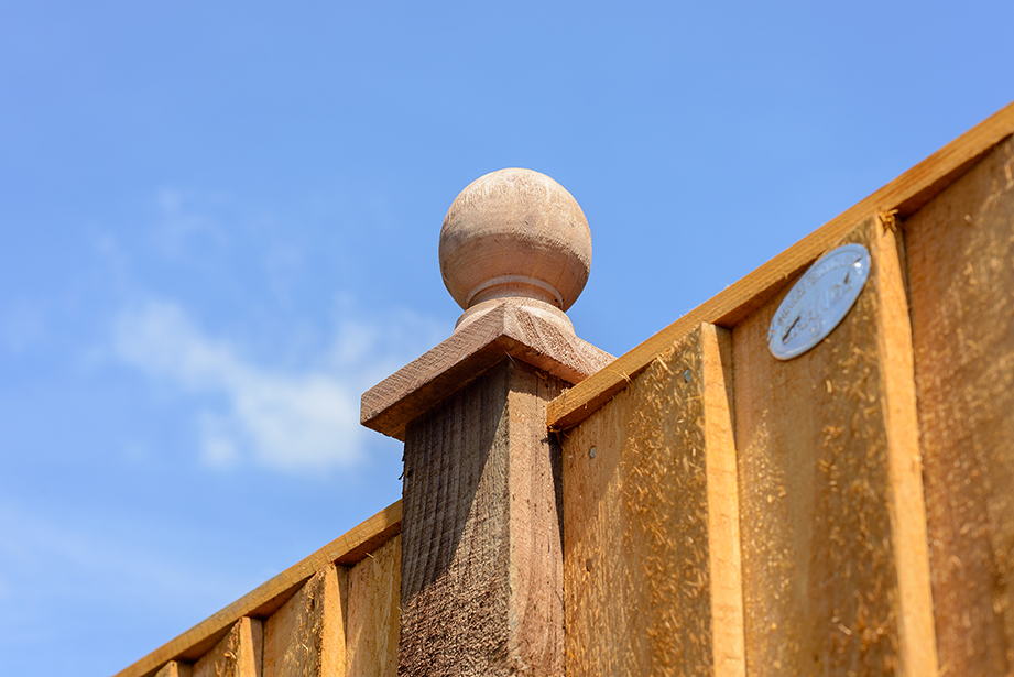 The Ball Finial Post Cap is a decorative way of finishing off fence panel posts. The design features a turned piece of timber that is pressure treated brown for protection against wood rot.