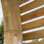 The Contemporary Garden Arch is a substantial and stylish structure. The chunky arched top, posts and slats are planed, rounded and chamfered for a modern look. Use with climbing plants along a pathway or as a standalone feature in your garden.