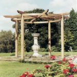 The Carousel Pergola is a timeless garden structure. The curves of the top beam reflect the natural shapes in your garden, whilst providing an effective frame for a garden feature beneath. The pressure-treated pale green timber protects from wood rot and decay