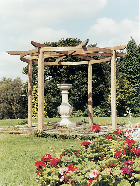 The Carousel Pergola is a timeless garden structure. The curves of the top beam reflect the natural shapes in your garden, whilst providing an effective frame for a garden feature beneath. The pressure-treated pale green timber protects from wood rot and decay