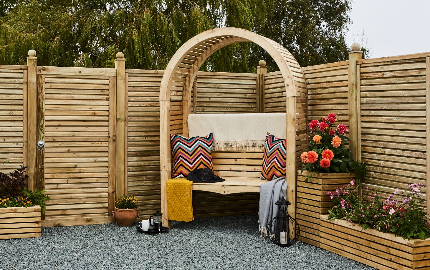 This Contemporary Arbour has real presence with modern straight lines, and a classic curved roof using quality finger joints. The arbour is pressure-treated to provide protection from wood rot and fungal decay.