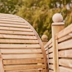 This Contemporary Arbour has real presence with modern straight lines, and a classic curved roof using quality finger joints. The arbour is pressure-treated to provide protection from wood rot and fungal decay.