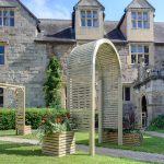 The Contemporary Garden Arch is a substantial and stylish structure. The chunky arched top, posts and slats are planed, rounded and chamfered for a modern look. Use with climbing plants along a pathway or as a standalone feature in your garden.