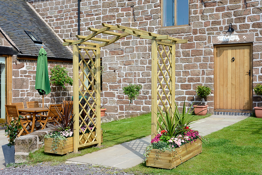 The Elite Portico Arch’s unique design with a curved roof and lattice style trellis side panels offers a stylish solution for any garden space. The space for hanging baskets will enhance a path, or it can be used as a standalone feature. The pressure treated finish provides ultimate durability.