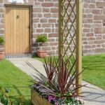 The Elite Portico Arch’s unique design with a curved roof and lattice style trellis side panels offers a stylish solution for any garden space. The space for hanging baskets will enhance a path, or it can be used as a standalone feature. The pressure treated finish provides ultimate durability.