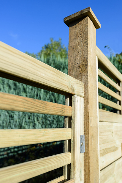 Featuring straight cut slats and a horizontal-style trellis top, the Elite Lille panel from Grange Fencing has been pressure-treated for long-lasting use. 