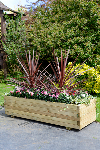 This Elite Rectangle Planter is a robust planter ideal for planting displays, or growing vegetables. The smooth pressure treated timber is planed and heavy duty. The sturdy frame is supported by a metal locating pin in each corner, ensuring long-term durability.