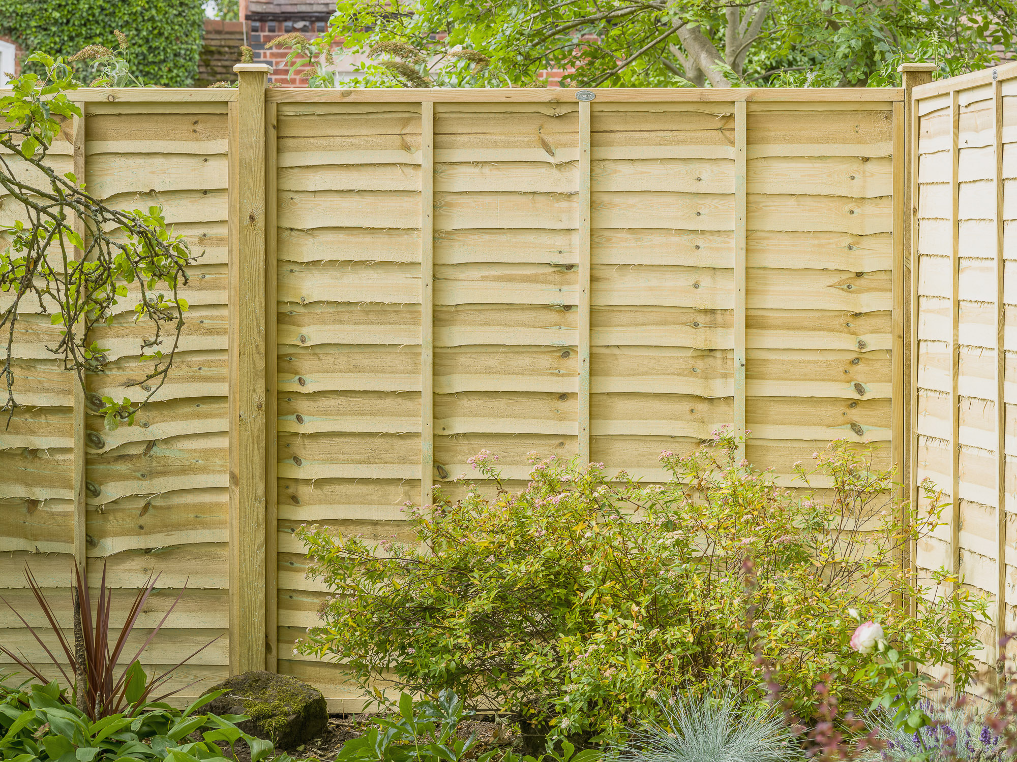 PROFESSIONAL LAP FENCE PANEL A stronger lap panel with three battens and new rebated frame construction. Available in a choice of three colours, pressure-treated golden brown, pressure-treated green or dark brown for protection against wood rot and fungal decay.