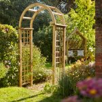 The Elite Granville Arch has a classical look as well as being strong and robust. This arch is suitable as a freestanding structure on either a path or garden space. The square trellis sides are ideal for climbing plants. Made from pressure treated timber and finished in pale green for longevity in use.