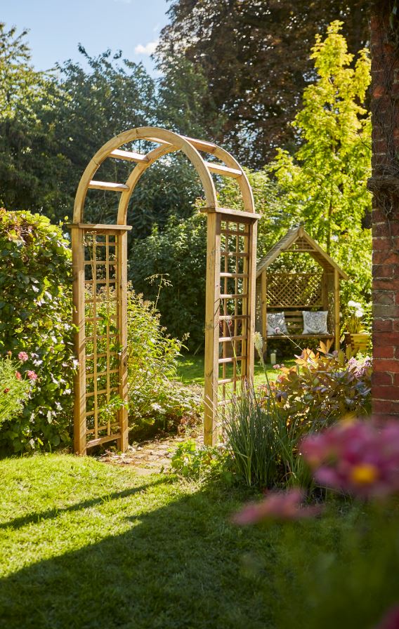 The Elite Granville Arch has a classical look as well as being strong and robust. This arch is suitable as a freestanding structure on either a path or garden space. The square trellis sides are ideal for climbing plants. Made from pressure treated timber and finished in pale green for longevity in use.