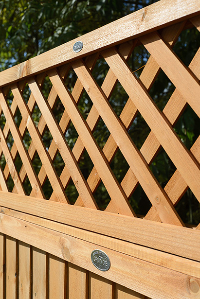 The lattice style trellis has a rebated double frame for extra strength and manufactured from fine sawn timber for an extra smooth finish. Ideal as a privacy screen, the Highgrove is pressure-treated in a golden brown treatment which offers protection against wood rot and fungal decay.