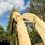 The contemporary Flower Circle is constructed using two pressure-treated timber rounded beams closely connected with stainless steel rods to create a sculptural archway. This versatile product can be used singularly or with multiples to create a unique pathway.