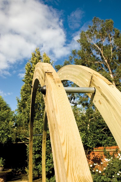 The contemporary Flower Circle is constructed using two pressure-treated timber rounded beams closely connected with stainless steel rods to create a sculptural archway. This versatile product can be used singularly or with multiples to create a unique pathway.