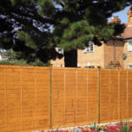 PROFESSIONAL LAP FENCE PANEL A stronger lap panel with three battens and new rebated frame construction. Available in a choice of three colours, pressure-treated golden brown, pressure-treated green or dark brown for protection against wood rot and fungal decay.