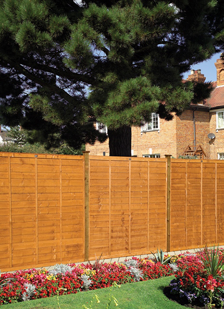 PROFESSIONAL LAP FENCE PANEL A stronger lap panel with three battens and new rebated frame construction. Available in a choice of three colours, pressure-treated golden brown, pressure-treated green or dark brown for protection against wood rot and fungal decay.