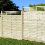 Featuring straight cut slats and a horizontal-style trellis top, the Elite Lille panel from Grange Fencing has been pressure-treated for long-lasting use. 